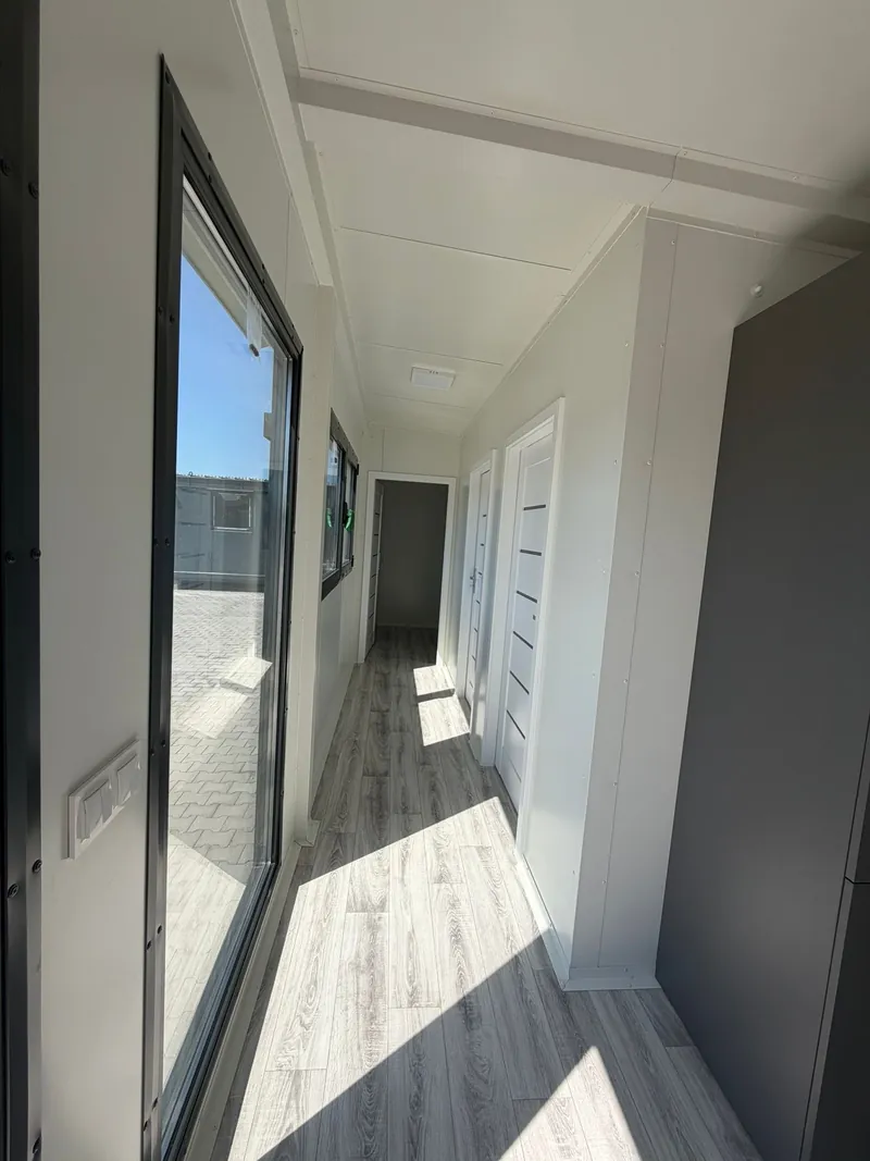 Internal hallway with doors to the rooms