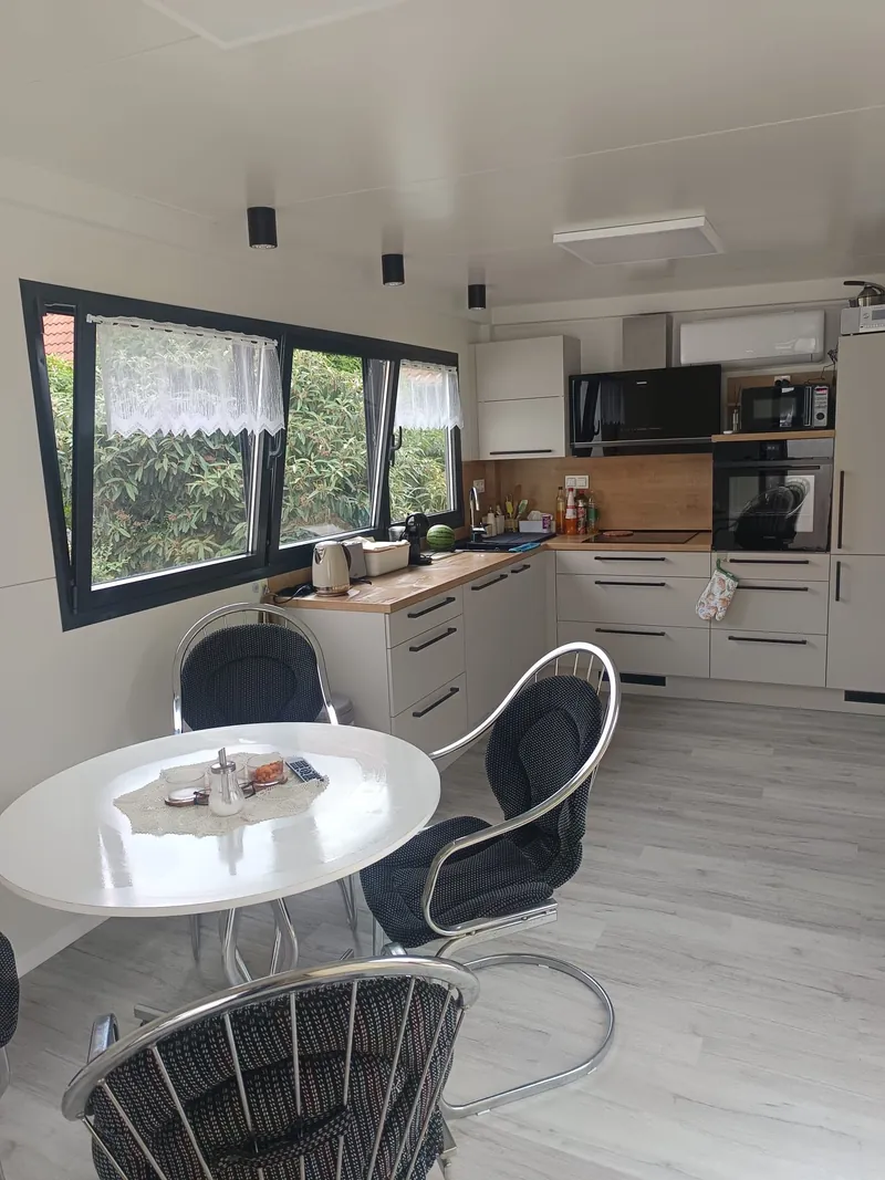Kitchen with dining area inside a module