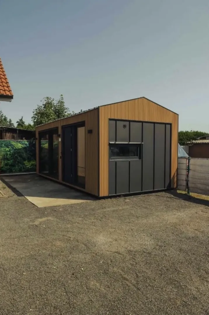 Module with timber and anthracite facade