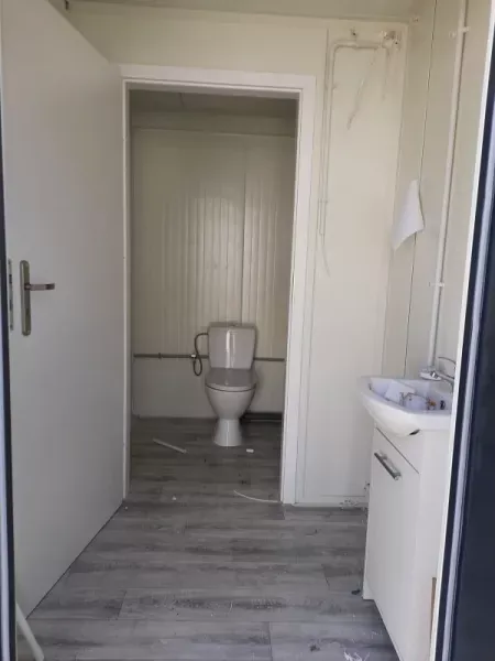 WC cubicle inside the sanitary container